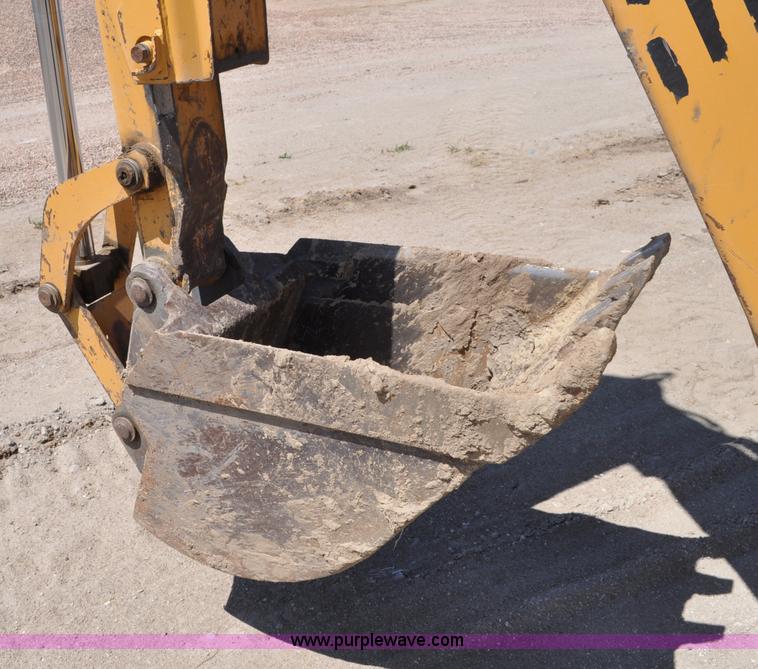 image for item A5959 New Holland 555E backhoe