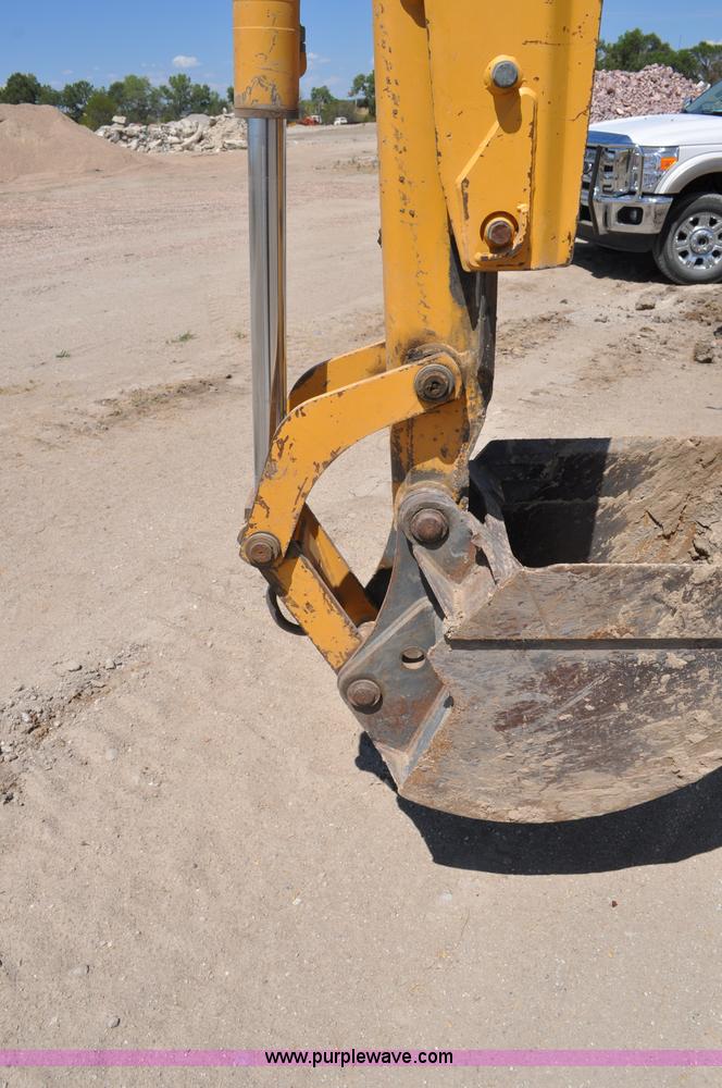 image for item A5959 New Holland 555E backhoe