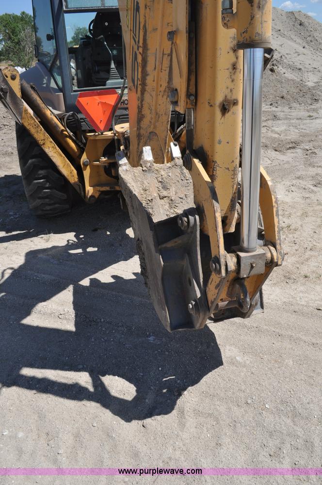 image for item A5959 New Holland 555E backhoe