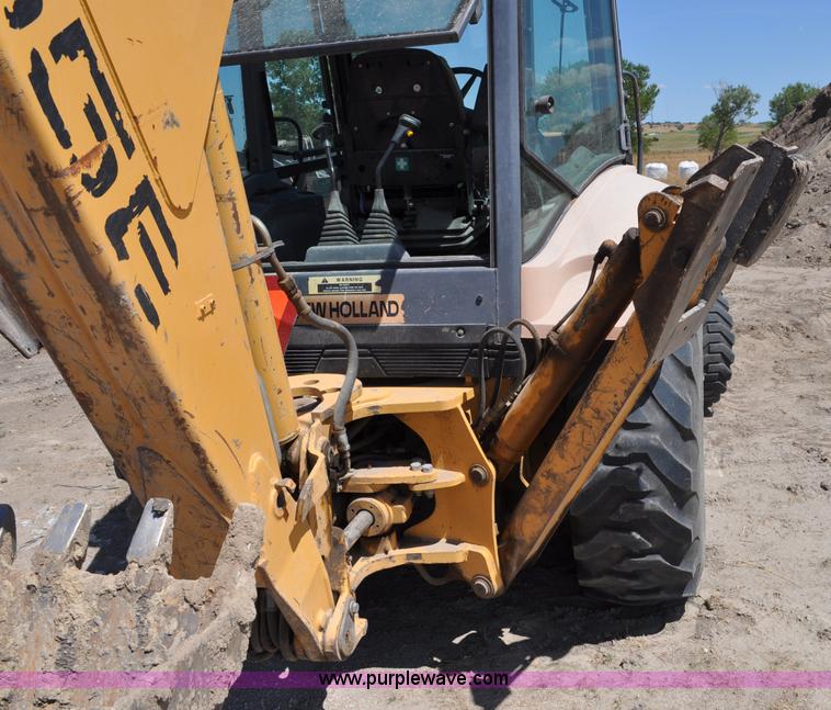 image for item A5959 New Holland 555E backhoe