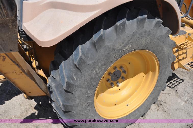 image for item A5959 New Holland 555E backhoe