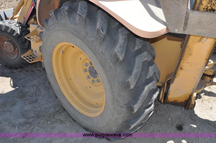 image for item A5959 New Holland 555E backhoe