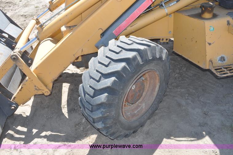 image for item A5959 New Holland 555E backhoe