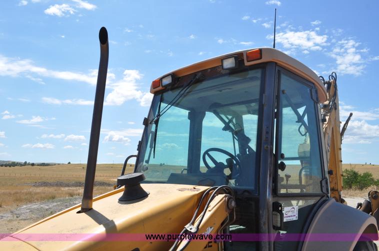 image for item A5959 New Holland 555E backhoe