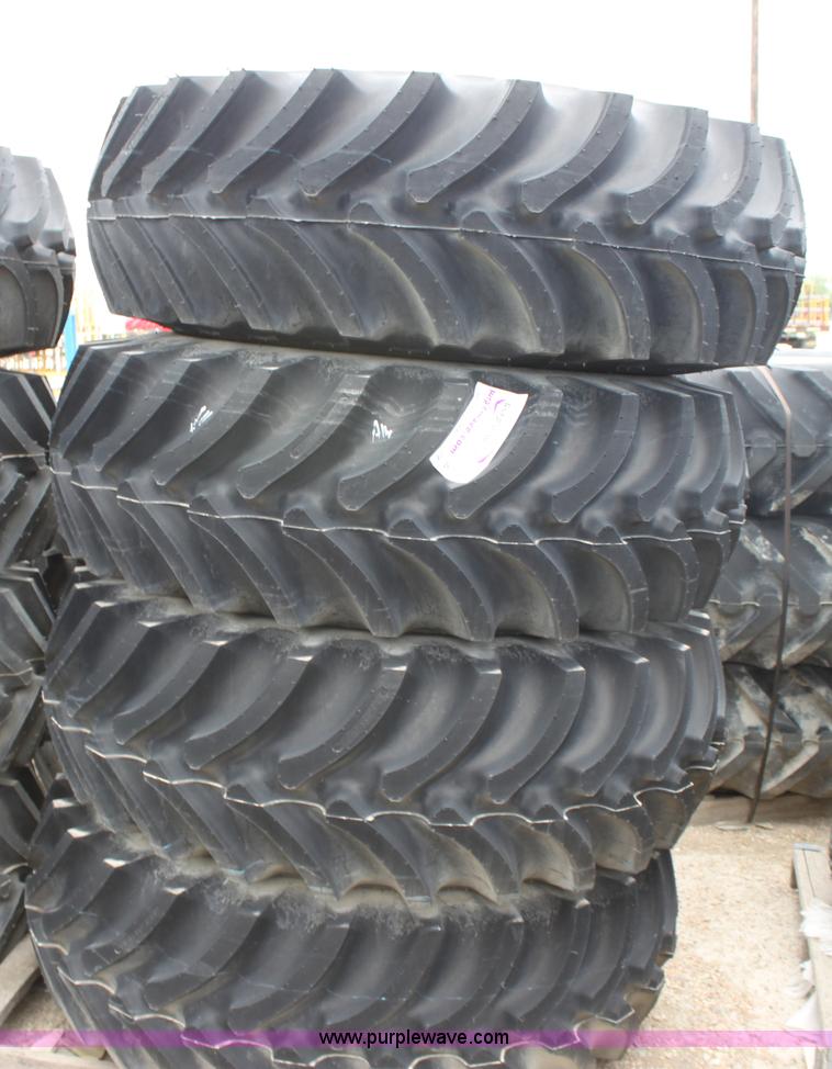 image for item B7383 (4) Firestone Super All Tract 18.4-26 tires