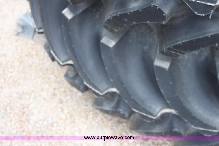 image for item B7384 (4) Firestone Super All Tract 18.4-26 tires