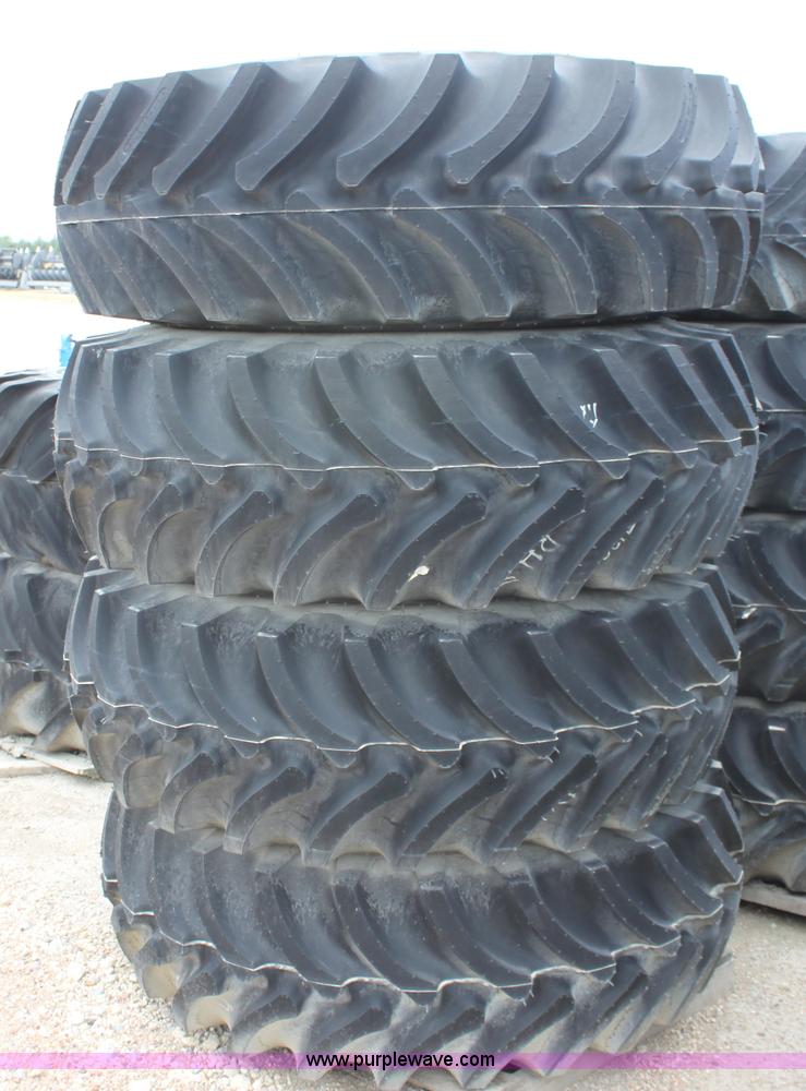 image for item B7385 (4) Firestone Super All Tract 18.4-26 tires