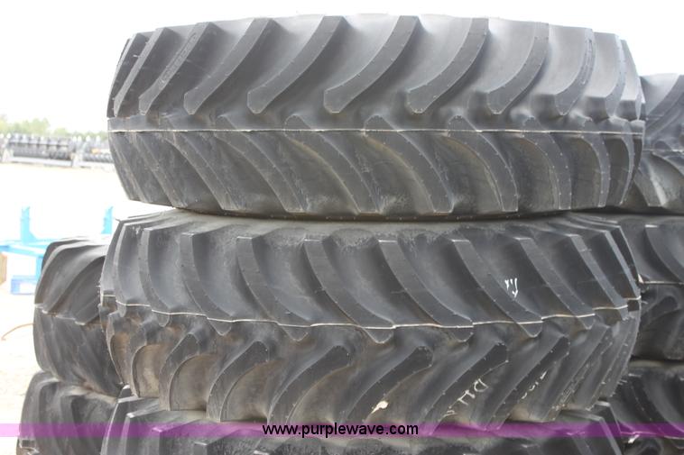 image for item B7385 (4) Firestone Super All Tract 18.4-26 tires