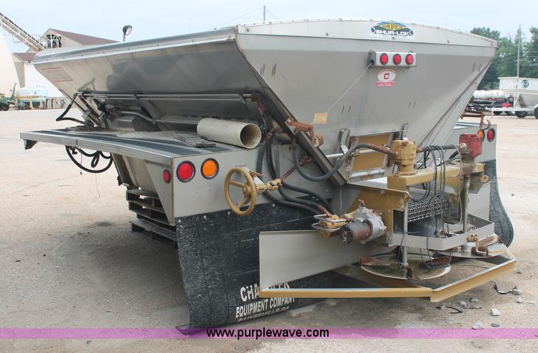 image for item C2674 2007 Chandler 12' stainless steel truck spreader