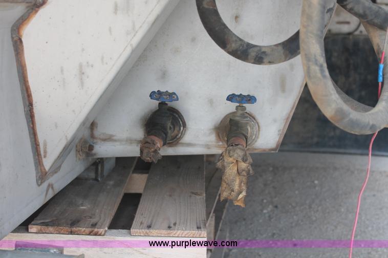 image for item C2674 2007 Chandler 12' stainless steel truck spreader