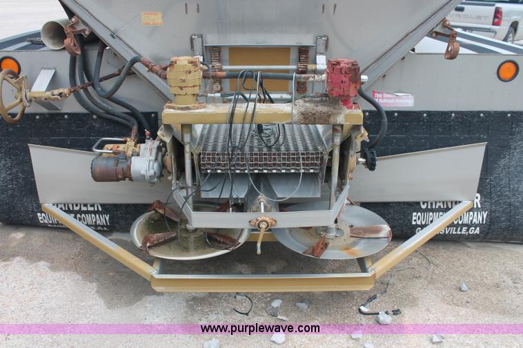 image for item C2674 2007 Chandler 12' stainless steel truck spreader
