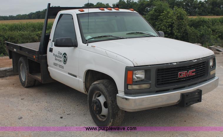 image for item C2679 1997 GMC Sierra 3500 flatbed pickup truck