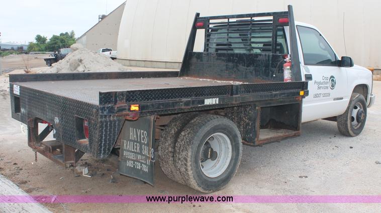 image for item C2679 1997 GMC Sierra 3500 flatbed pickup truck