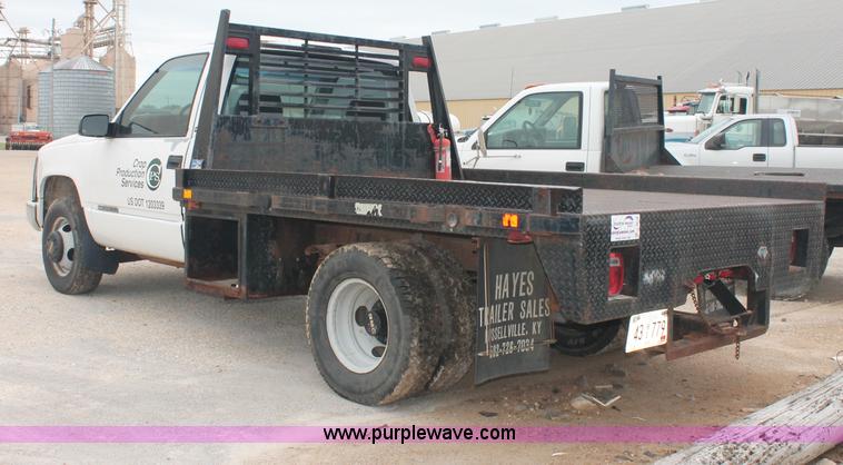 image for item C2679 1997 GMC Sierra 3500 flatbed pickup truck