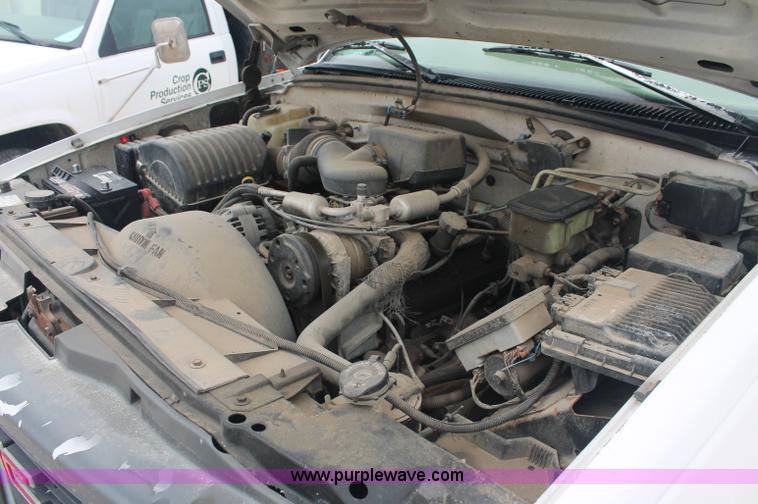 image for item C2679 1997 GMC Sierra 3500 flatbed pickup truck