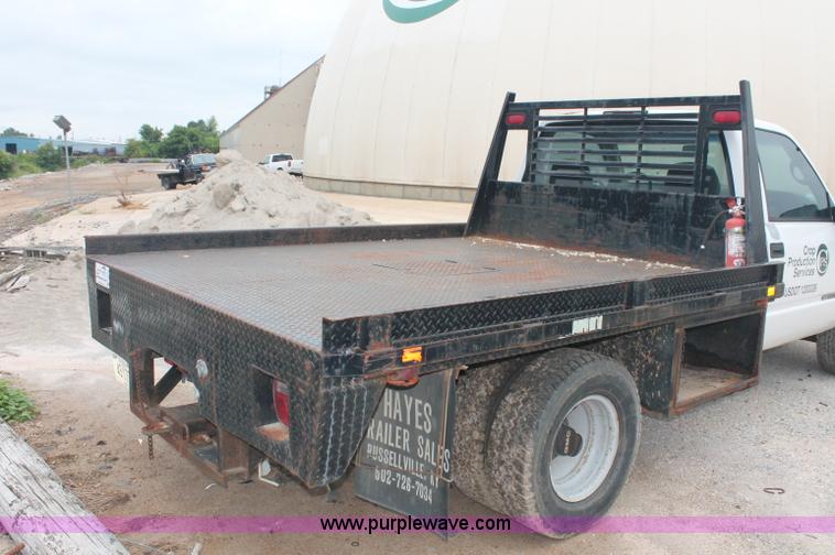 image for item C2679 1997 GMC Sierra 3500 flatbed pickup truck