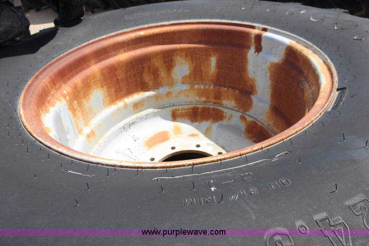 image for item D5471 (4) Firestone Super all Traction 24.5-32 tires