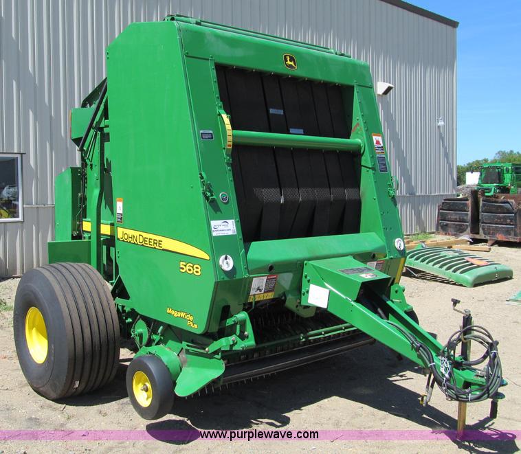 image for item F5504 2009 John Deere 568 round baler