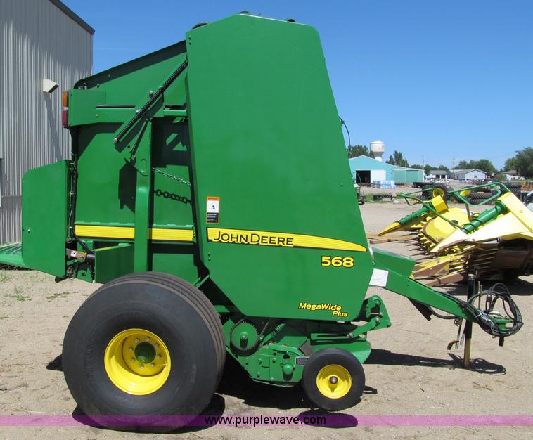 image for item F5504 2009 John Deere 568 round baler