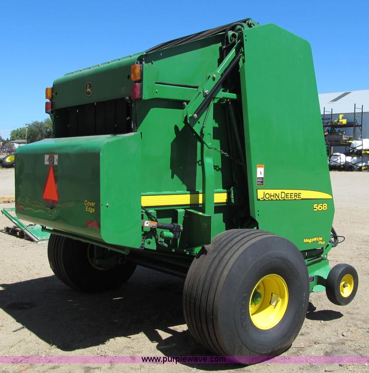 image for item F5504 2009 John Deere 568 round baler