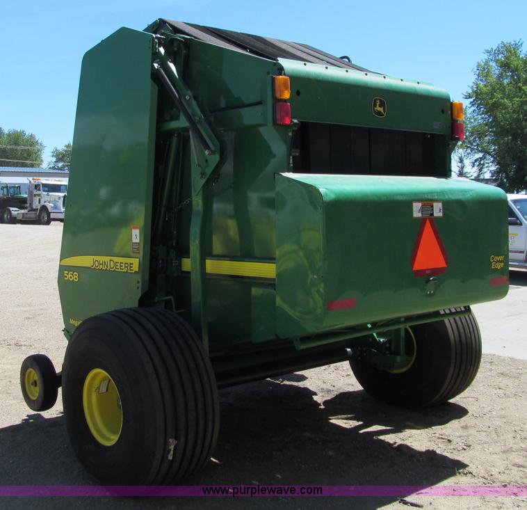 image for item F5504 2009 John Deere 568 round baler