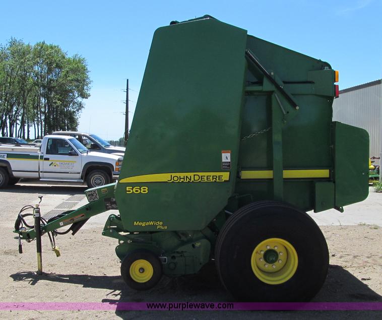 image for item F5504 2009 John Deere 568 round baler