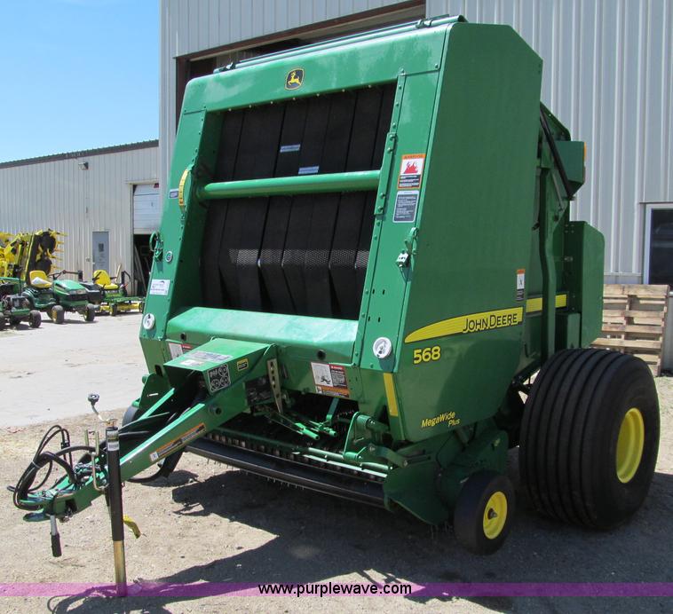 image for item F5504 2009 John Deere 568 round baler