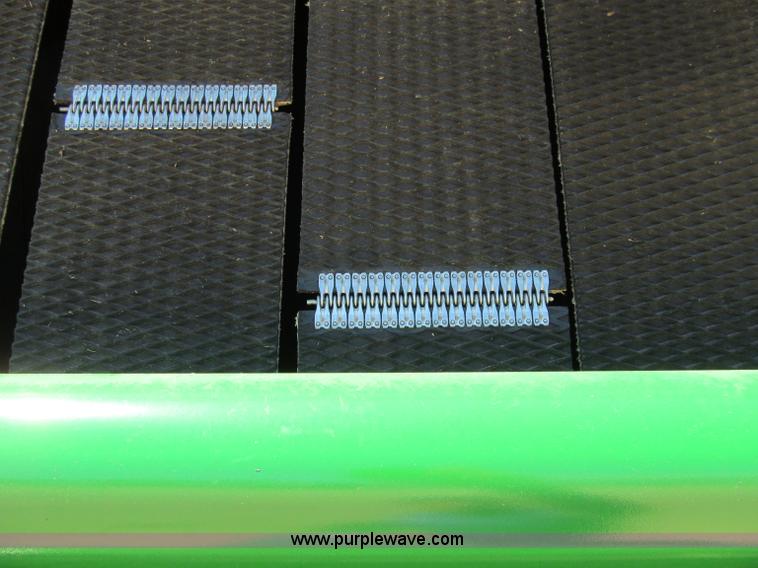 image for item F5504 2009 John Deere 568 round baler