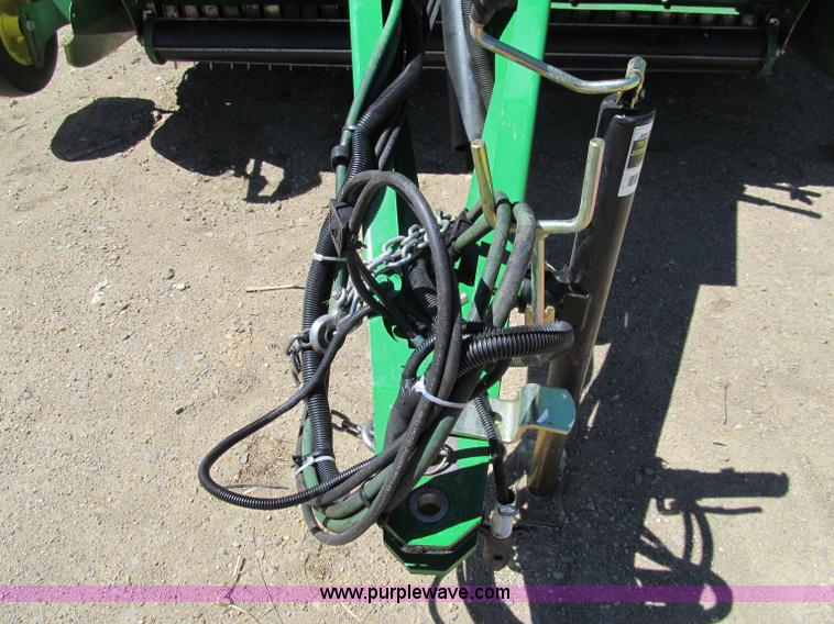 image for item F5504 2009 John Deere 568 round baler