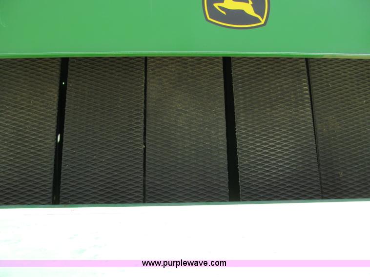 image for item F5504 2009 John Deere 568 round baler