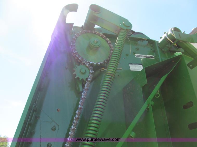 image for item F5504 2009 John Deere 568 round baler