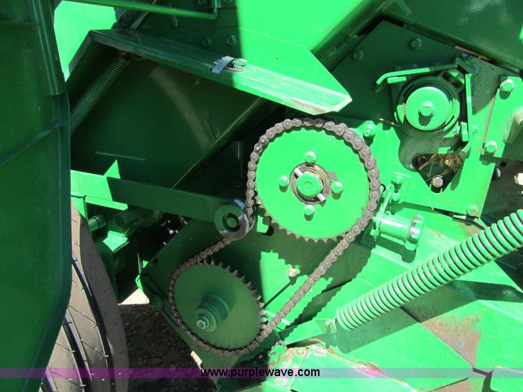 image for item F5504 2009 John Deere 568 round baler