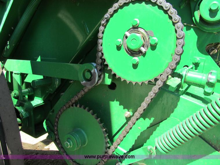 image for item F5504 2009 John Deere 568 round baler