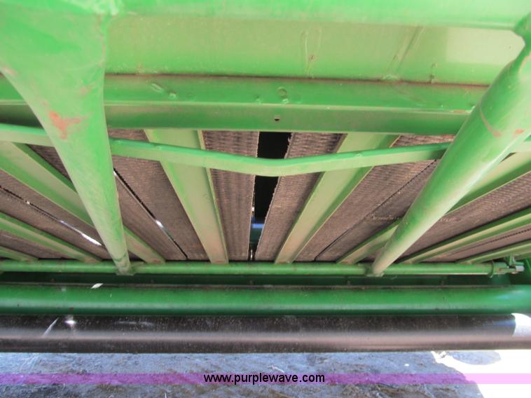 image for item F5504 2009 John Deere 568 round baler