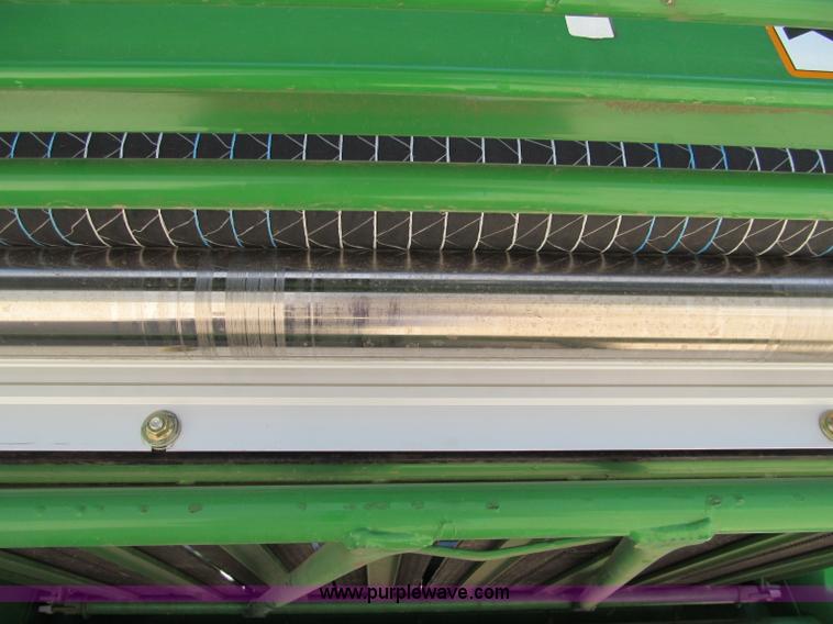 image for item F5504 2009 John Deere 568 round baler