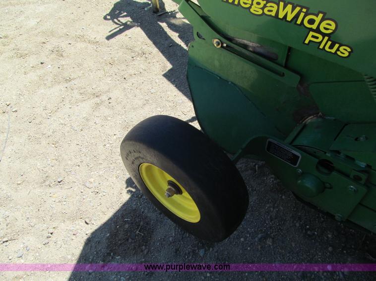 image for item F5504 2009 John Deere 568 round baler