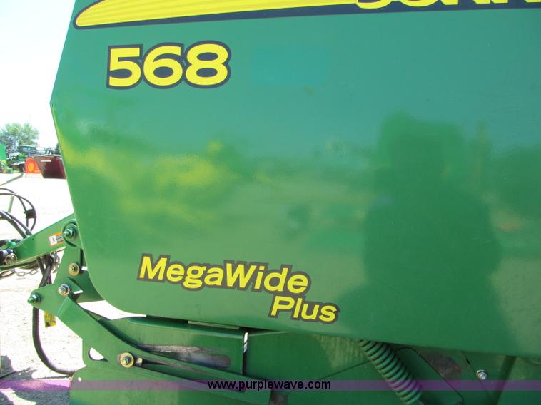 image for item F5504 2009 John Deere 568 round baler