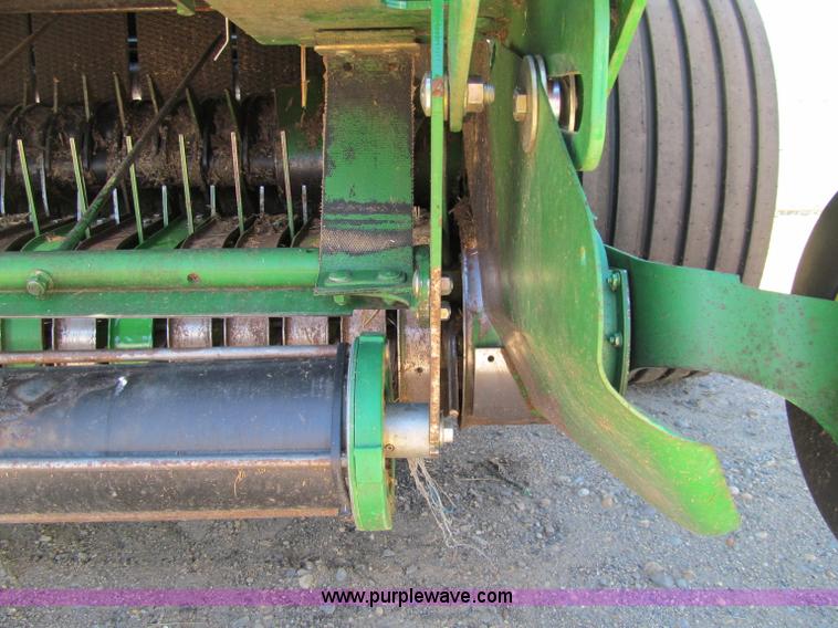 image for item F5504 2009 John Deere 568 round baler