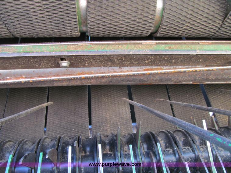 image for item F5504 2009 John Deere 568 round baler