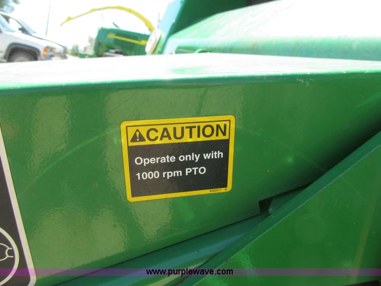 image for item F5504 2009 John Deere 568 round baler