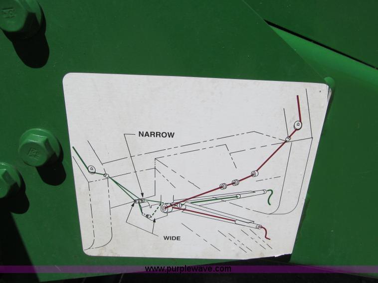image for item F5504 2009 John Deere 568 round baler