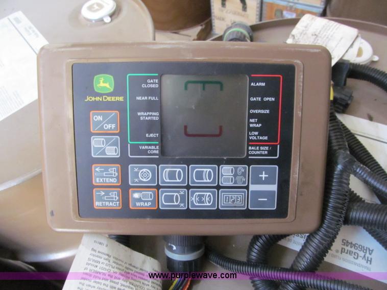 image for item F5504 2009 John Deere 568 round baler