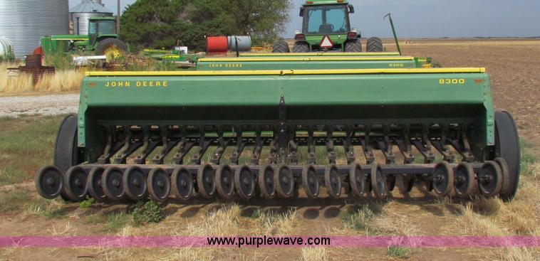 image for item N9091 (3) John Deere 8300 drills