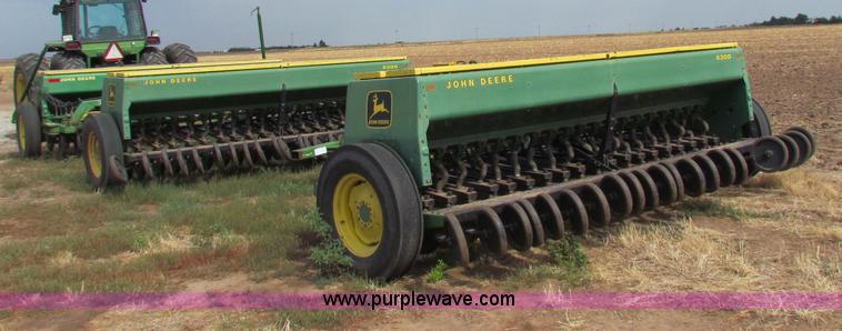 image for item N9091 (3) John Deere 8300 drills