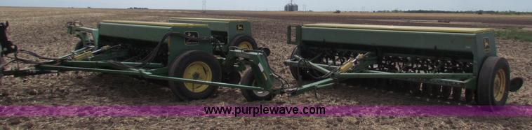 image for item N9091 (3) John Deere 8300 drills