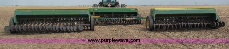 image for item N9091 (3) John Deere 8300 drills