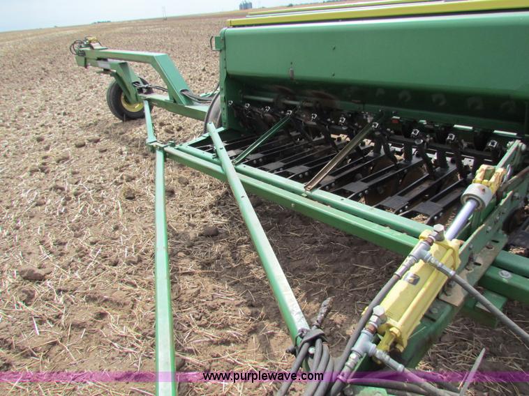 image for item N9091 (3) John Deere 8300 drills