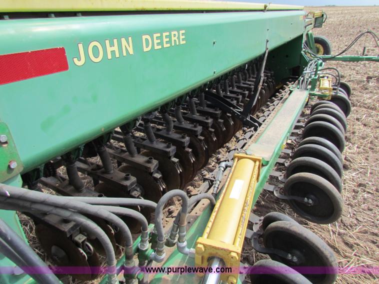 image for item N9091 (3) John Deere 8300 drills