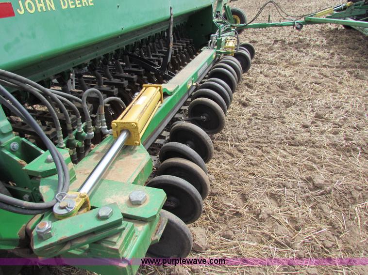 image for item N9091 (3) John Deere 8300 drills