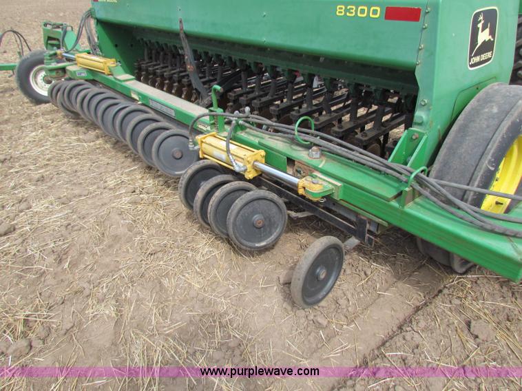 image for item N9091 (3) John Deere 8300 drills